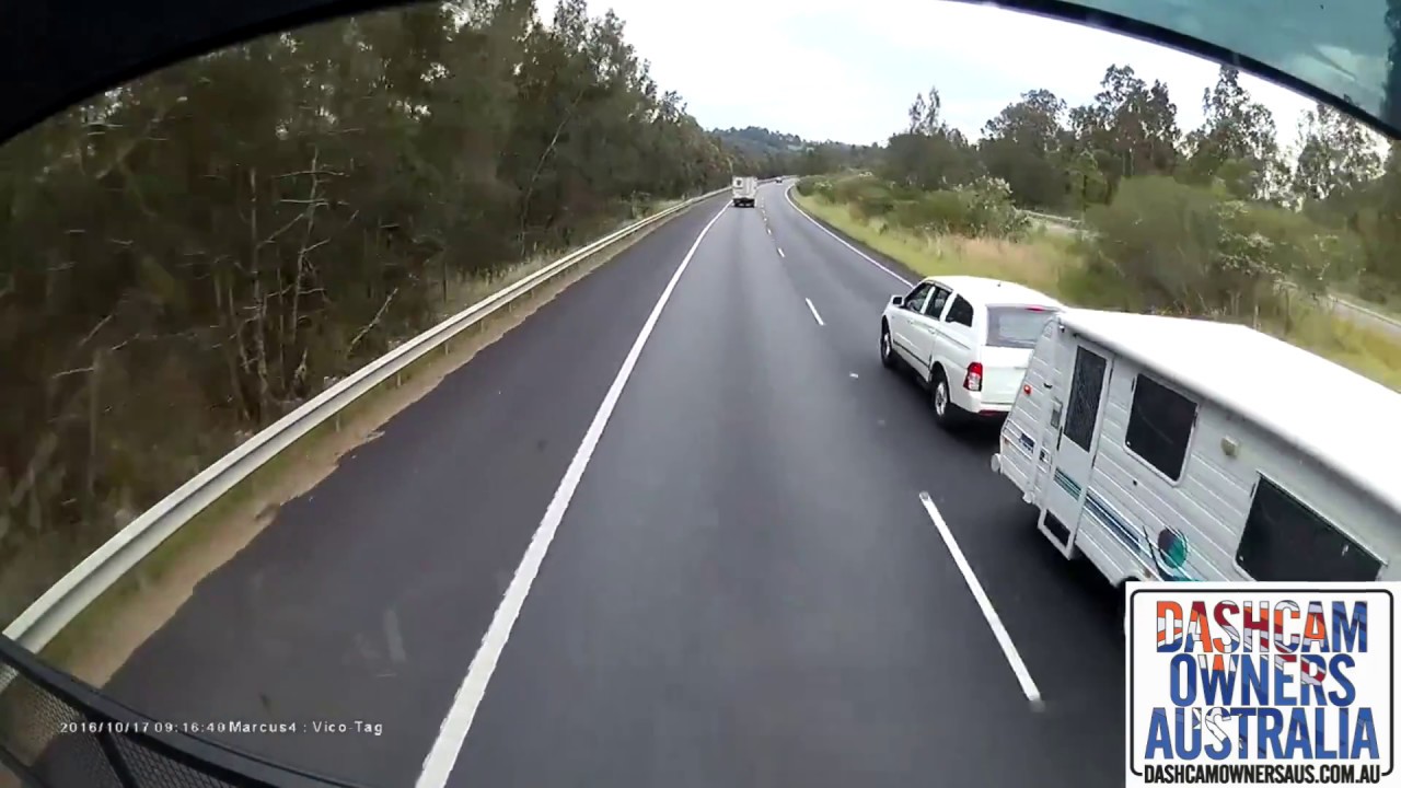 Car and Caravan lose control after overtaking Truck