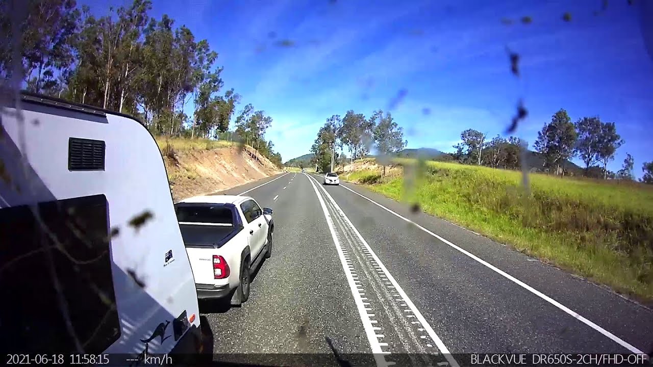 Caravanner merges into truck - Tiaro QLD
