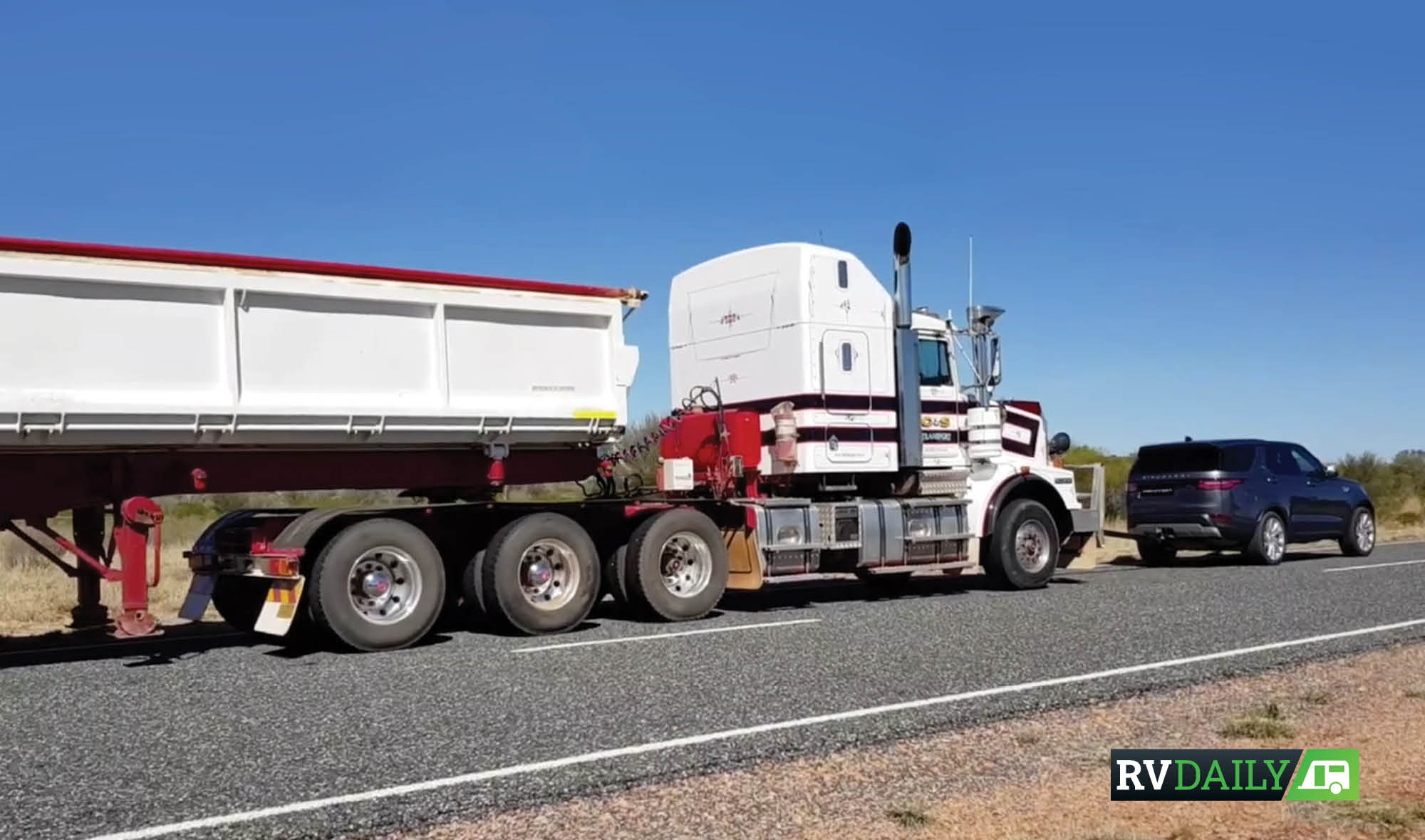 LANDROVER DISCOVERY TOWS A ROAD TRAIN