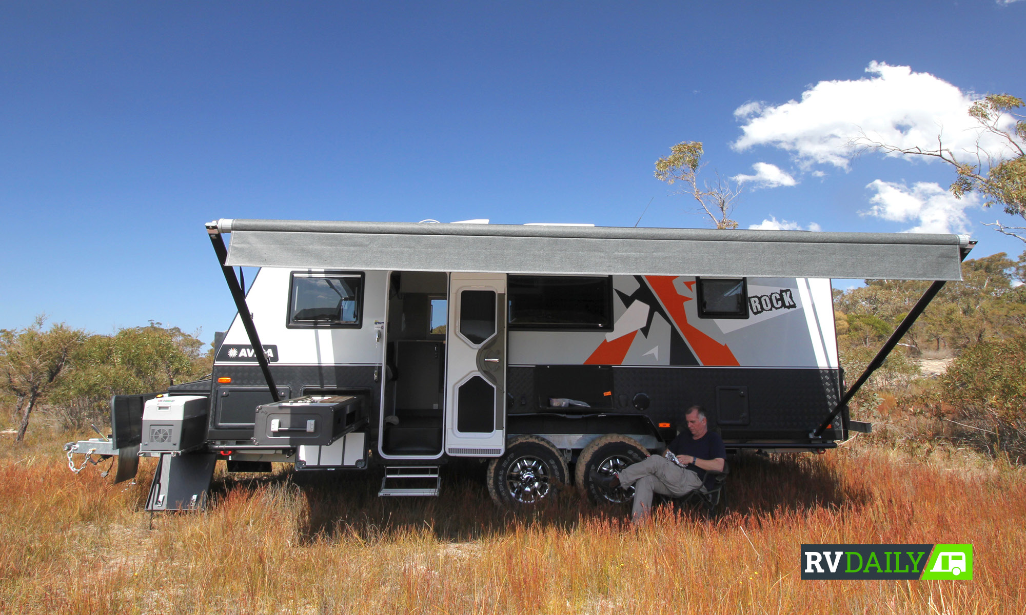 Relaxing under the awning with the Avida Rock