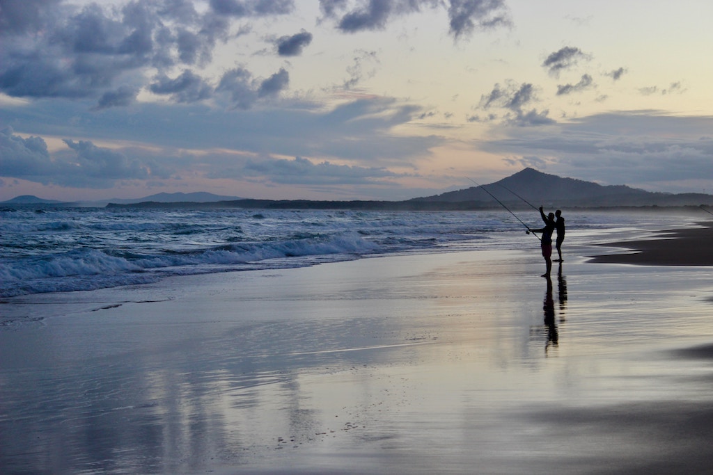 Beach Fishing At Sunset