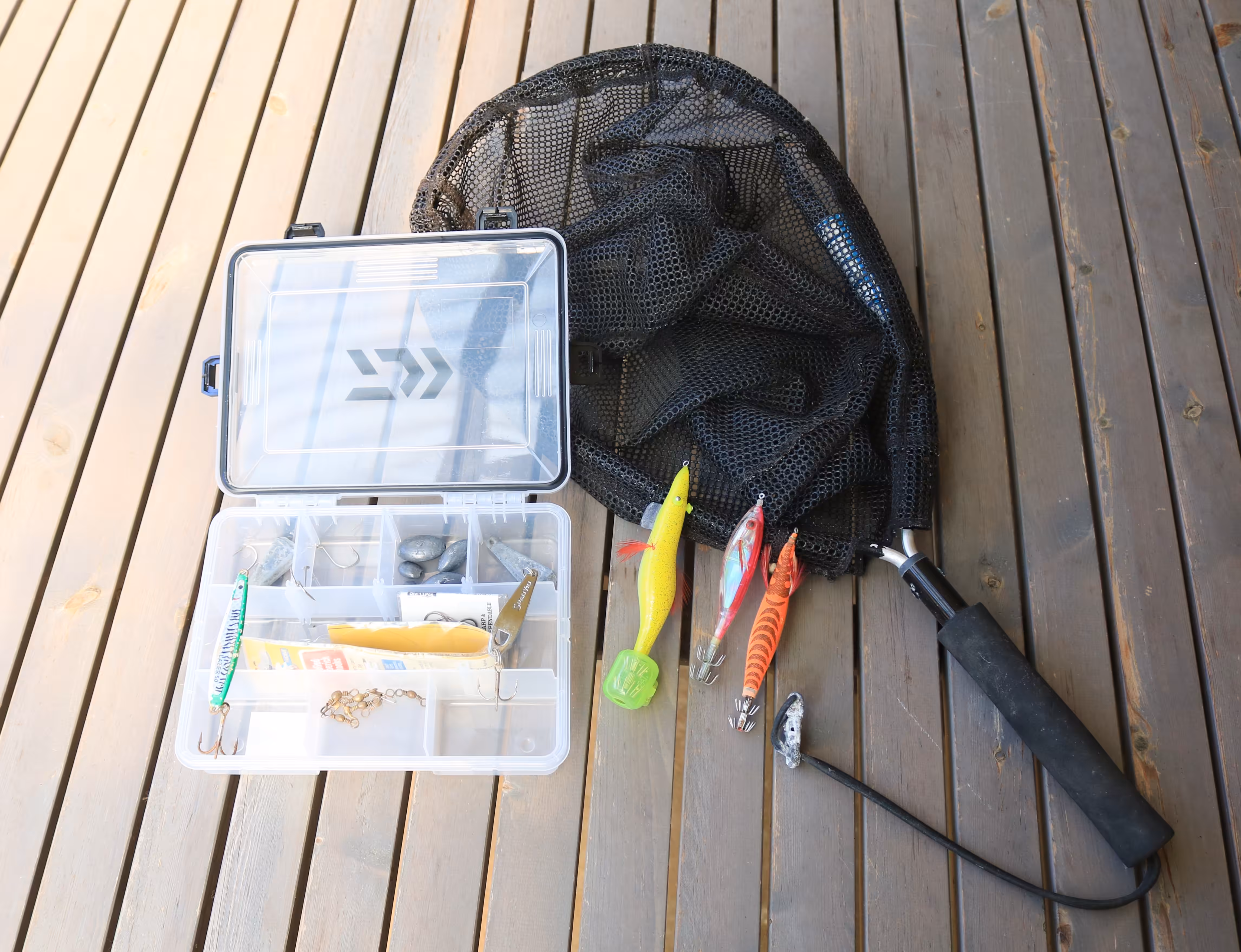 Tack box and landing net