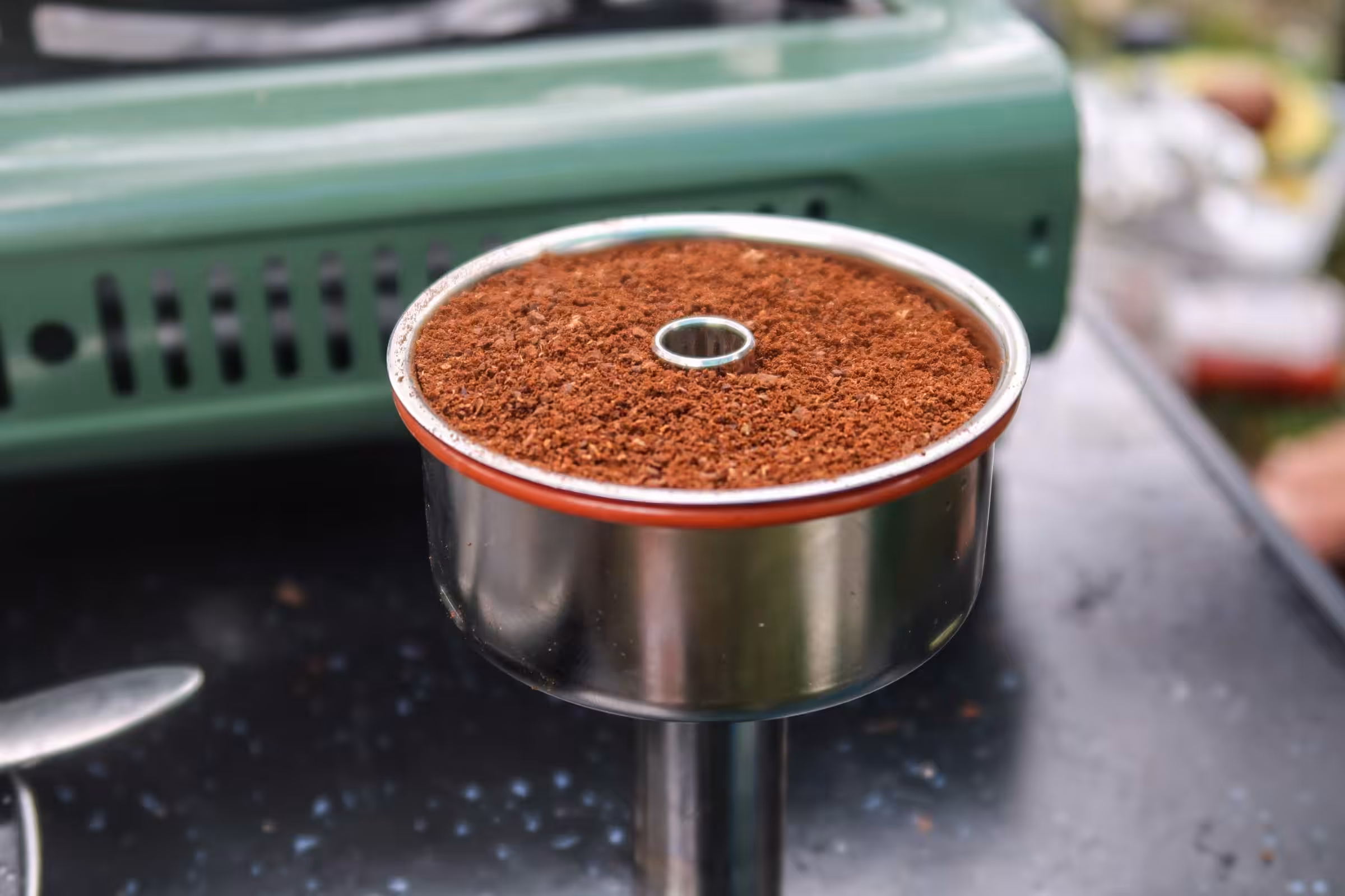 Filter basket filled with coffee