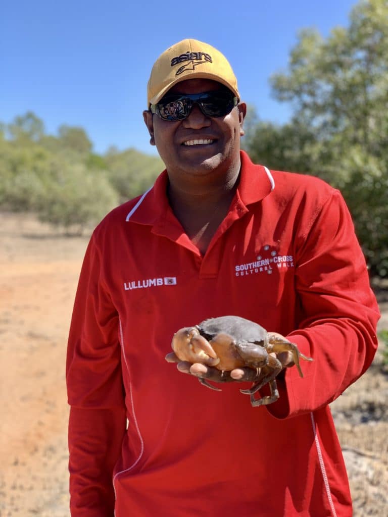 Tour guide with a crab