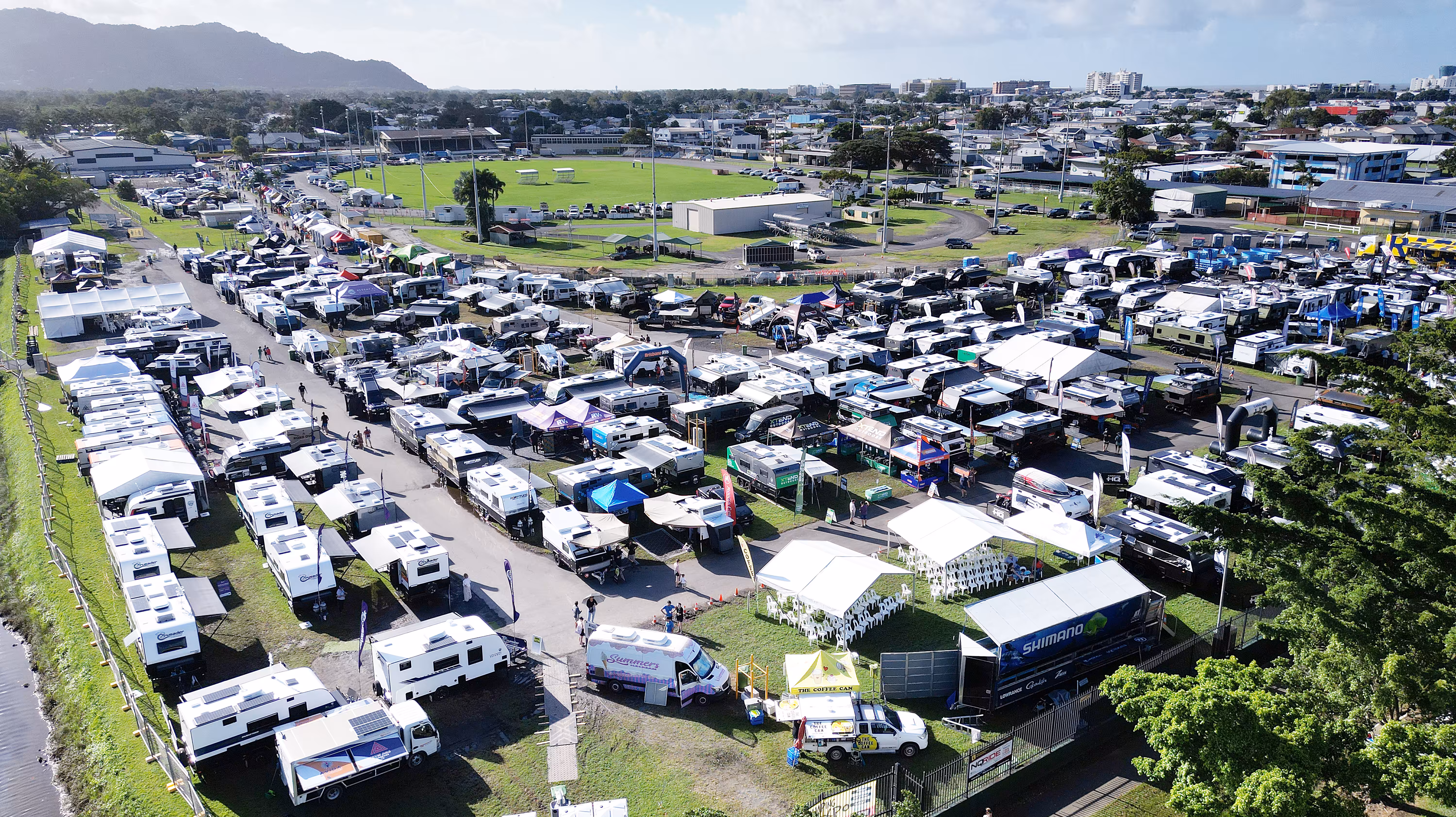 A sea of caravans at an outdoor expo.