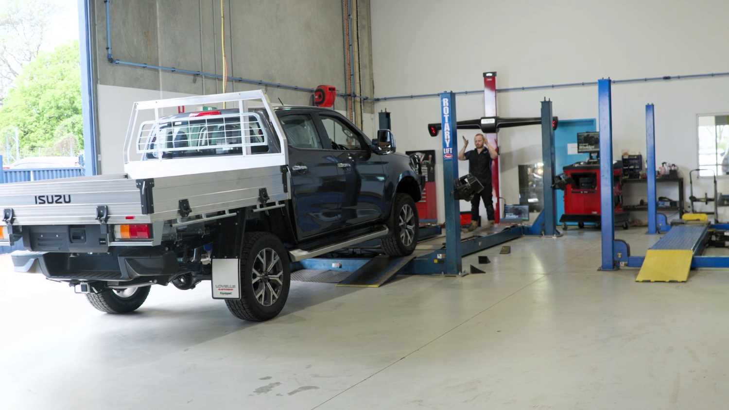 Ute going onto hoist for a 4WD wheel alignment