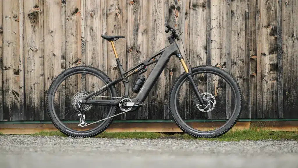 Cube Stereo Hybrid dual suspension e-bike on a gravel fire trail