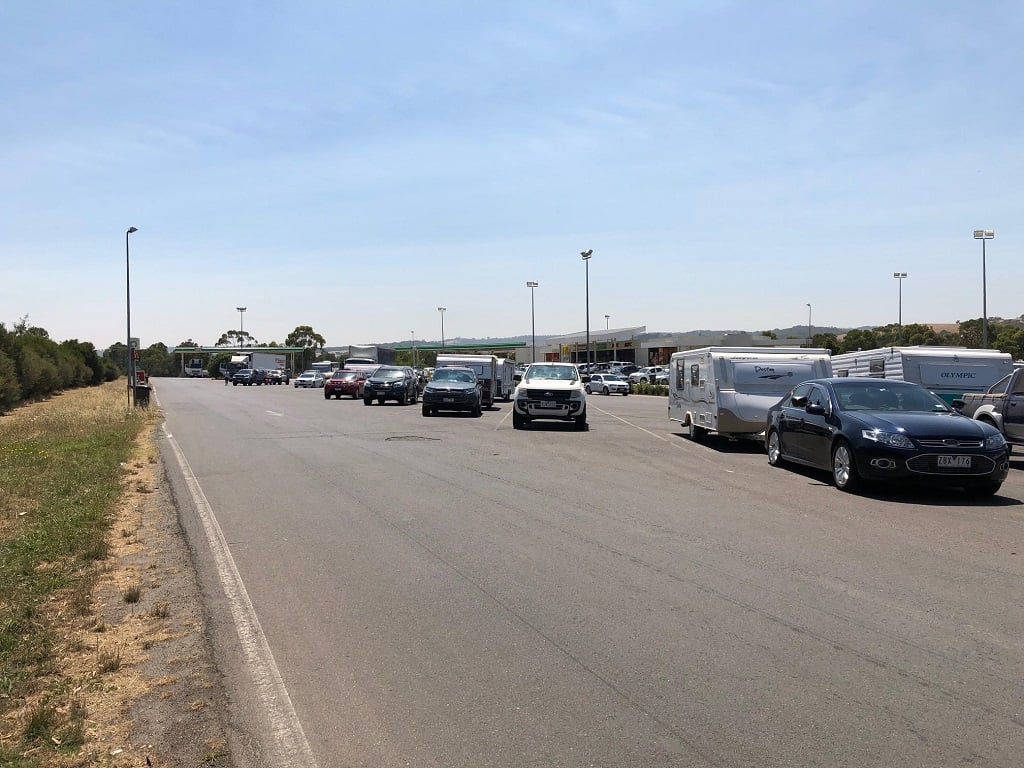 A Day At Bp Southbound In Wallan, Victoria With Cars, Caravans And Boat Trailers In The Truck Parking Bays