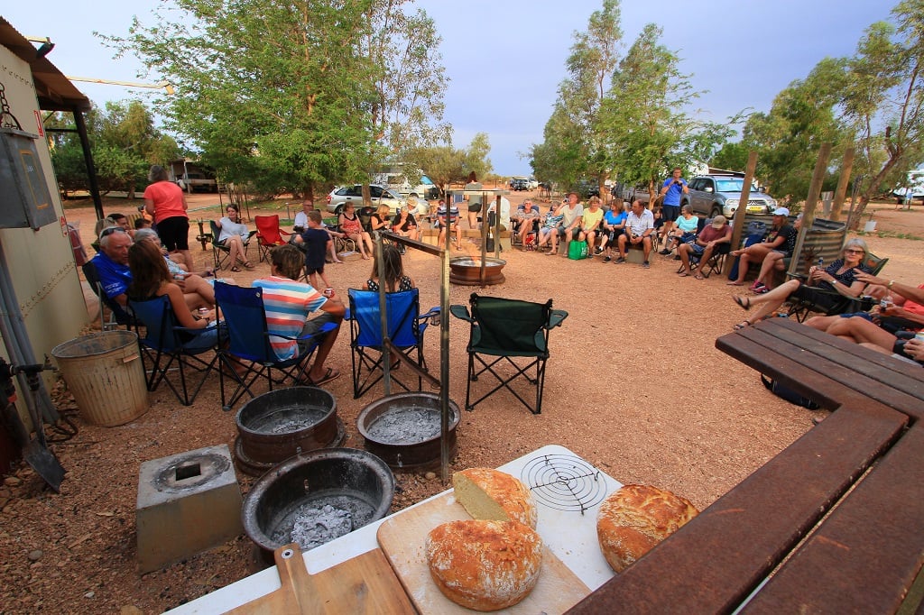 Everyone Gathered Around The Campfire With Damper John