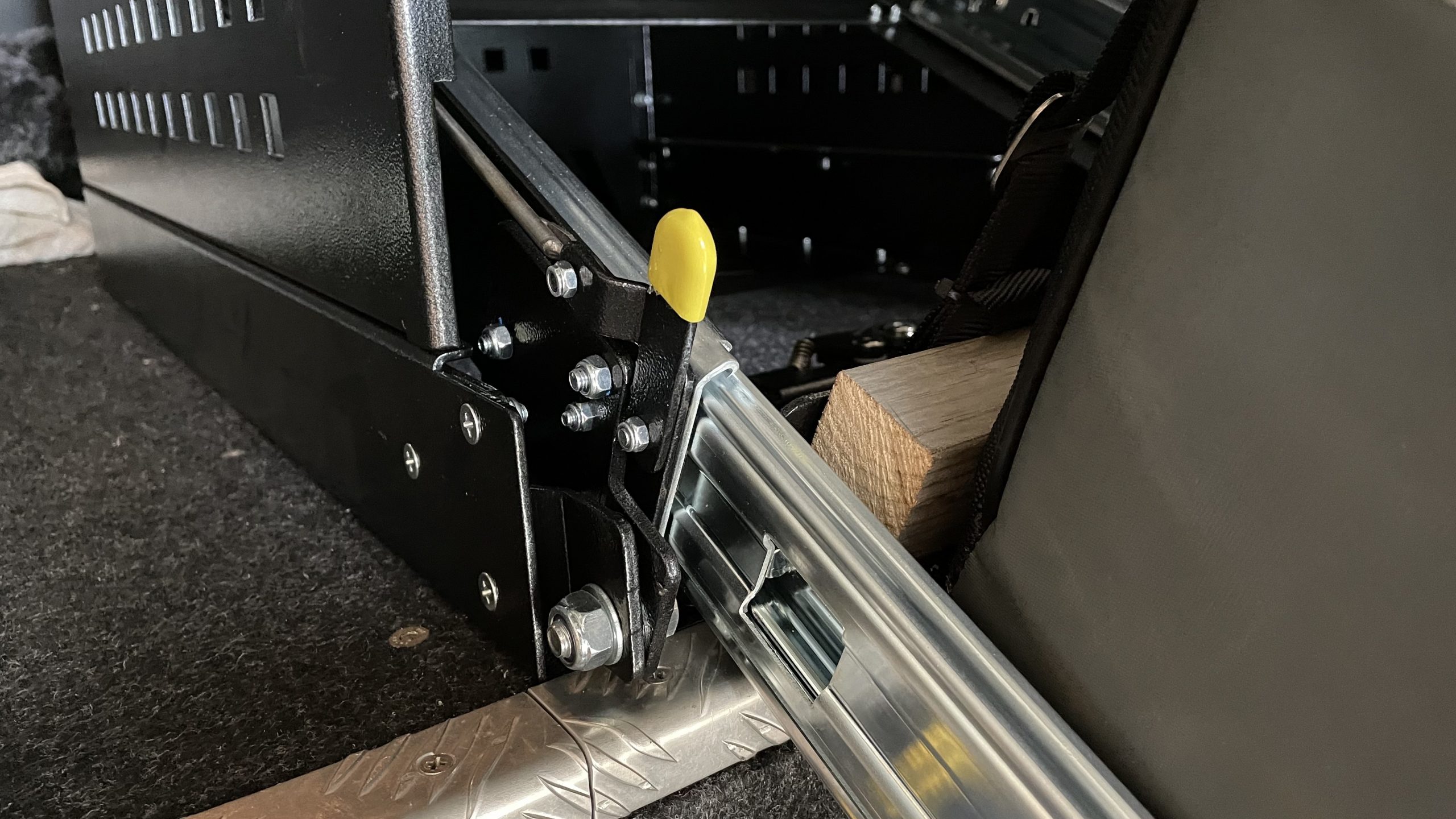 Tilt fridge slide - release lever